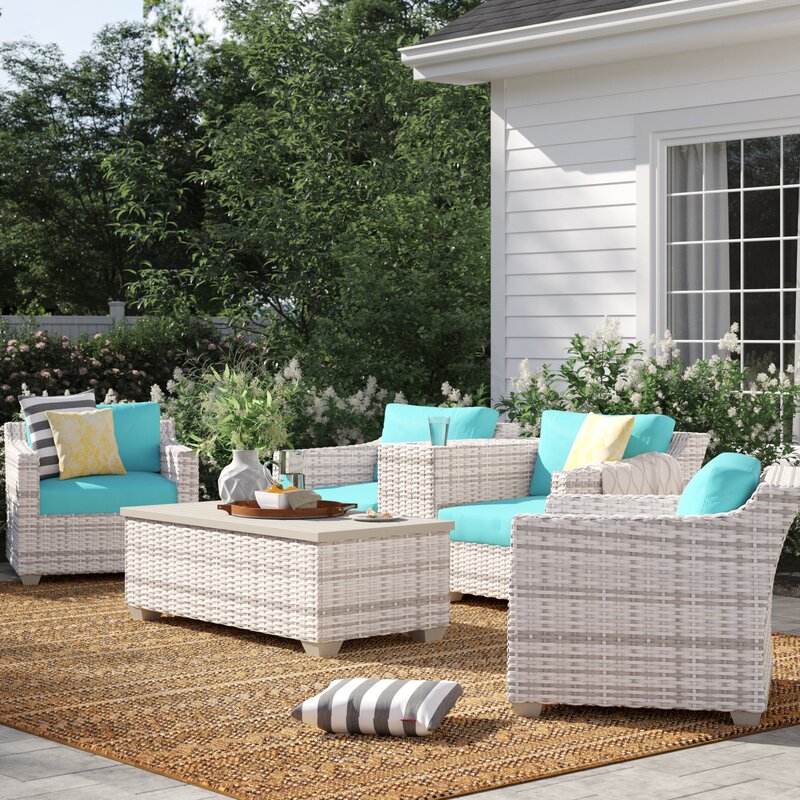  Falmouth 4 Piece Rattan Sectional Seating Group with Cushions