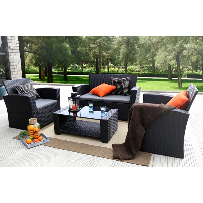  Reordan 4 Piece Rattan Sofa Seating Group with Cushions